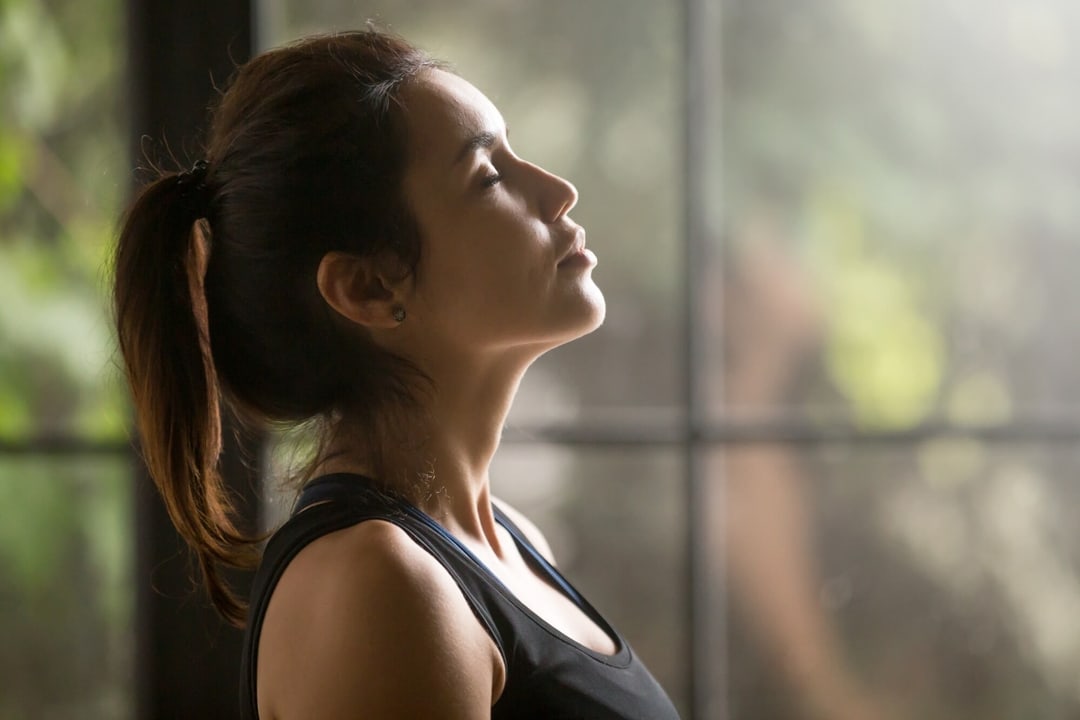 How Can Breathing Possibly Help Fix My Back Pain?